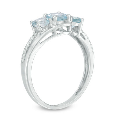 Aquamarine and 0.04 CT. T.W. Diamond Three Stone Bypass Ring in 10K White Gold