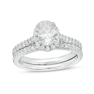 1.20 CT. T.W. Canadian Certified Oval Centre Diamond Frame Bridal Set in 14K White Gold (I/SI2)