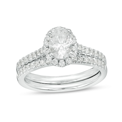 1.20 CT. T.W. Canadian Certified Oval Centre Diamond Frame Bridal Set in 14K White Gold (I/SI2)