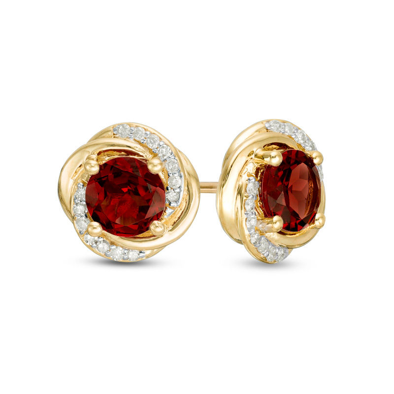 6.0mm Garnet and 0.14 CT. T.W. Diamond Orbit Frame Stud Earrings in 10K Gold|Peoples Jewellers