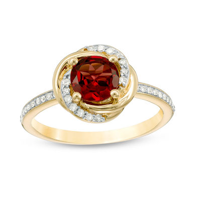 6.0mm Garnet and 0.15 CT. T.W. Diamond Orbit Frame Ring in 10K Gold