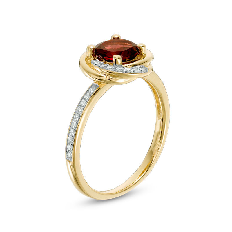 6.0mm Garnet and 0.15 CT. T.W. Diamond Orbit Frame Ring in 10K Gold|Peoples Jewellers