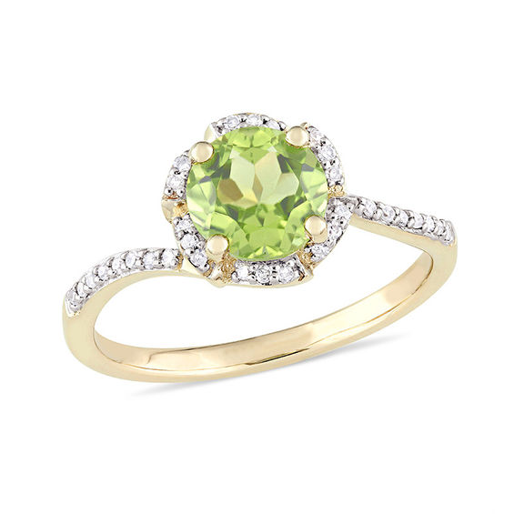 7.0mm Peridot and 0.10 CT. T.W. Diamond Floral Frame Bypass Ring in 14K Gold