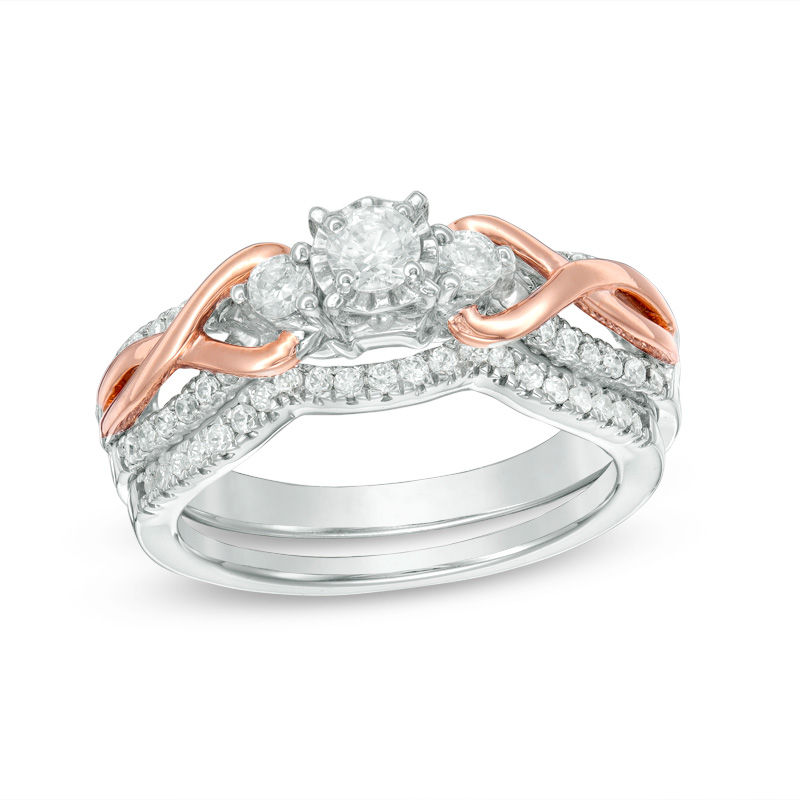 0.45 CT. T.W. Diamond Three Stone Loop Twist Bridal Set in 10K Two-Tone Gold|Peoples Jewellers