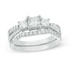 0.69 CT. T.W. Princess-Cut Diamond Three Stone Bridal Set in 10K White Gold