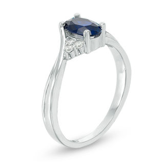 Oval Lab-Created Blue Sapphire and 0.085 CT. T.W. Diamond Tri-Sides Promise Ring in 10K White Gold