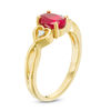 Oval Lab-Created Ruby and Diamond Accent Heart Sides Promise Ring in 10K Gold