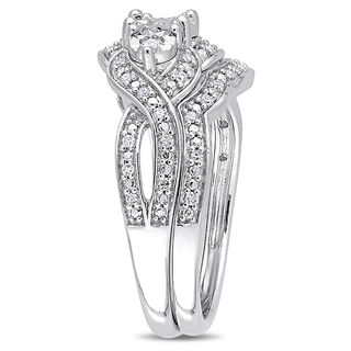 0.24 CT. T.W. Diamond Three Stone Frame Twist Bridal Set in Sterling Silver