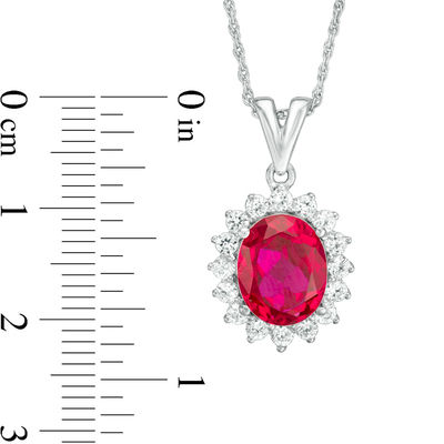 Oval Lab-Created Ruby and White Sapphire Sunburst Frame Pendant in Sterling Silver