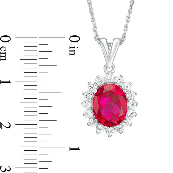 Oval Lab-Created Ruby and White Sapphire Sunburst Frame Pendant in Sterling Silver