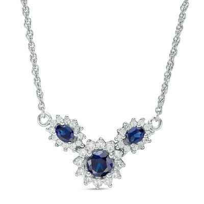 Oval and Round Lab-Created Blue and White Sapphire Sunburst Frame Three Stone Necklace in Sterling Silver