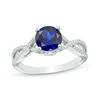 Thumbnail Image 0 of 7.0mm Lab-Created Blue Sapphire and 0.145 CT. T.W. Diamond Twist Shank Engagement Ring in 10K White Gold