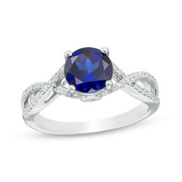 7.0mm Lab-Created Blue Sapphire and 0.145 CT. T.W. Diamond Twist Shank Engagement Ring in 10K White Gold