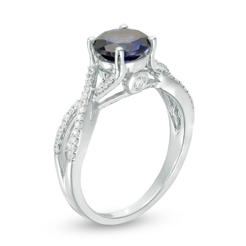 7.0mm Lab-Created Blue Sapphire and 0.145 CT. T.W. Diamond Twist Shank Engagement Ring in 10K White Gold