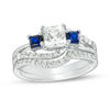 Thumbnail Image 0 of Princess-Cut Lab-Created Blue and White Sapphire with 0.37 CT. T.W. Diamond Three Stone Bridal Set in Sterling Silver