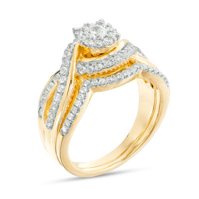 0.69 CT. T.W. Diamond Frame Bypass Bridal Set in 10K Gold