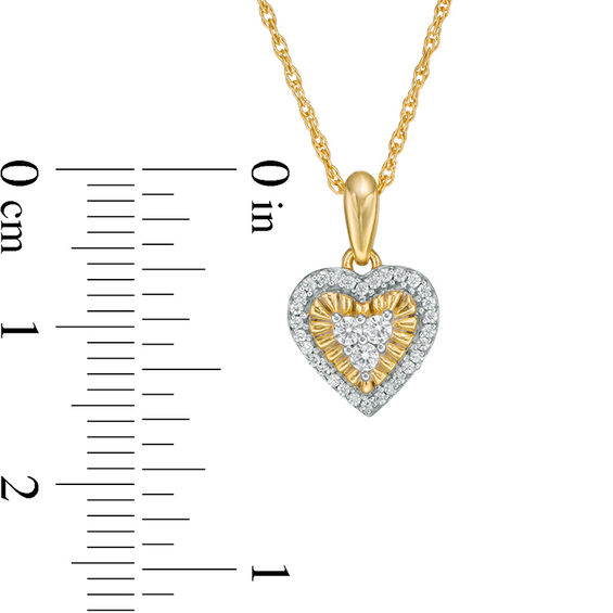 0.147 CT. T.W. Diamond Heart Frame Pendant in 10K Gold