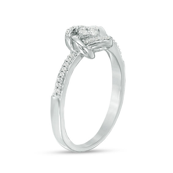 0.145 CT. T.W. Quad Diamond Love Knot Promise Ring in Sterling Silver