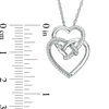 0.085 CT. T.W. Diamond Double Heart with Square Knot Pendant in Sterling Silver