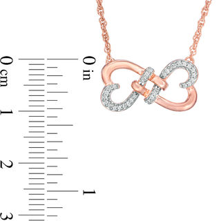 0.086 CT. T.W. Diamond Love Knot Double Heart Necklace in 10K Rose Gold - 17.5"