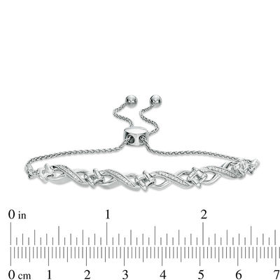 0.118 CT. T.W. Diamond Love Knot Infinity Bolo Bracelet in Sterling Silver - 9.5"