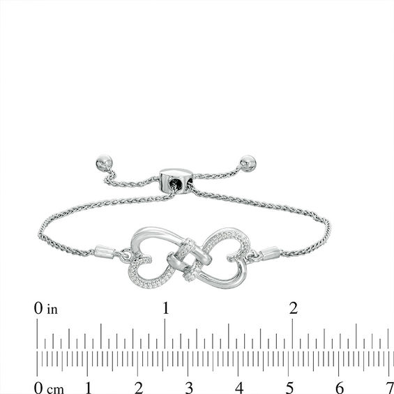 0.149 CT. T.W. Diamond Love Knot Hearts Bolo Bracelet in Sterling Silver - 9.5"