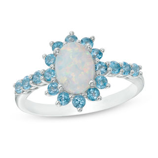 Oval Lab-Created Opal and Swiss Blue Topaz Starburst Frame Ring in Sterling Silver