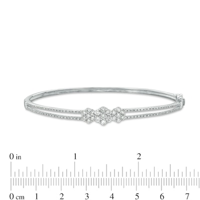 0.95 CT. T.W. Multi-Diamond Three Stone Bangle in 10K White Gold