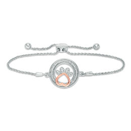 1/15 CT. T.W. Diamond Open Circle with Paw Print Bolo Bracelet in Sterling Silver and 10K Rose Gold (1 Line) - 9.5&quot;