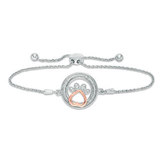 1/15 CT. T.W. Diamond Open Circle with Paw Print Bolo Bracelet in Sterling Silver and 10K Rose Gold (1 Line) - 9.5"