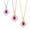 Oval Lab-Created Ruby and 0.148 CT. T.W. Diamond Teardrop Frame Leaf Pendant in 10K White, Yellow or Rose Gold