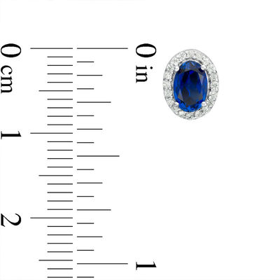 Oval Lab-Created Blue Sapphire and 0.14 CT. T.W. Diamond Frame Stud Earrings in 10K White Gold