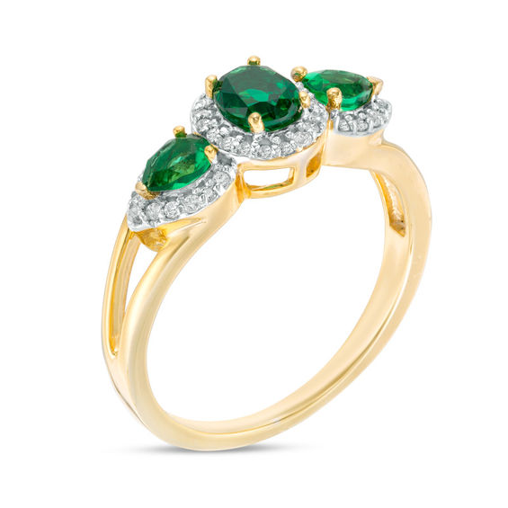 Oval and Pear-Shaped Lab-Created Emerald and 0.14 CT. T.W. Diamond Frame Three Stone Ring in 10K Gold