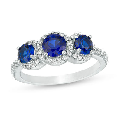 Lab-Created Blue Sapphire and 0.23 CT. T.W. Diamond Frame Three Stone Ring in 10K White Gold