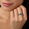 Thumbnail Image 1 of Lab-Created Blue Sapphire and 0.23 CT. T.W. Diamond Frame Three Stone Ring in 10K White Gold