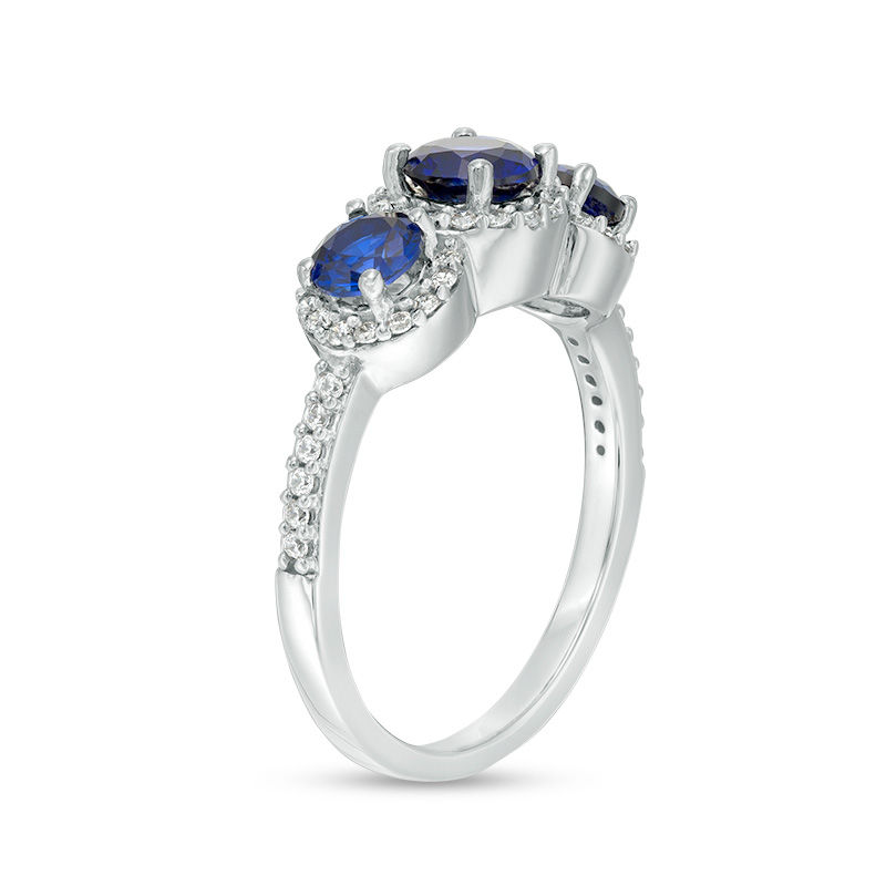 Lab-Created Blue Sapphire and 0.23 CT. T.W. Diamond Frame Three Stone Ring in 10K White Gold|Peoples Jewellers