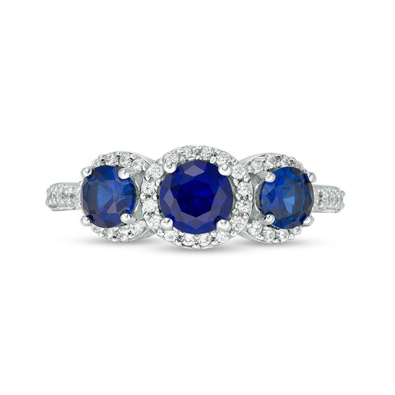 Lab-Created Blue Sapphire and 0.23 CT. T.W. Diamond Frame Three Stone Ring in 10K White Gold