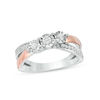 0.29 CT. T.W. Diamond Three Stone Crossover Engagement Ring in Sterling Silver and 10K Rose Gold