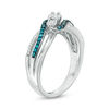 0.29 CT. T.W. Enhanced Blue and White Diamond Three Stone Bypass Ring in Sterling Silver