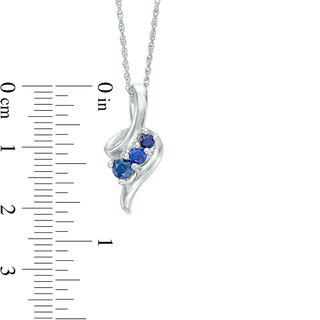 Graduated Lab-Created Blue Sapphire Beaded Swirl Ribbon Three Stone Pendant in Sterling Silver