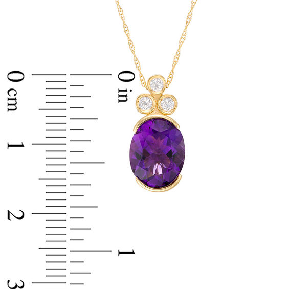 Oval Amethyst and 0.09 CT. T.W. Diamond Tri-Top Pendant in 10K Gold