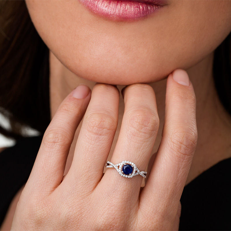 5.0mm Lab-Created Blue Sapphire and 0.18 CT. T.W. Diamond Frame Split Shank Ring in Sterling Silver|Peoples Jewellers