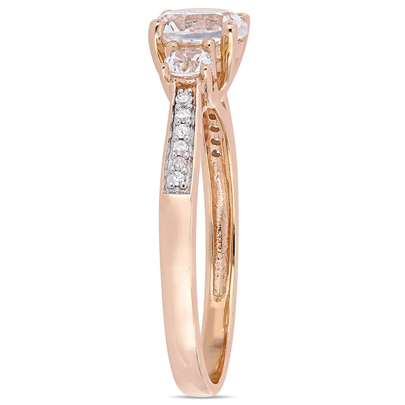 Lab-Created White Sapphire and 0.04 CT. T.W. Diamond Three Stone Engagement Ring in 10K Rose Gold|Peoples Jewellers