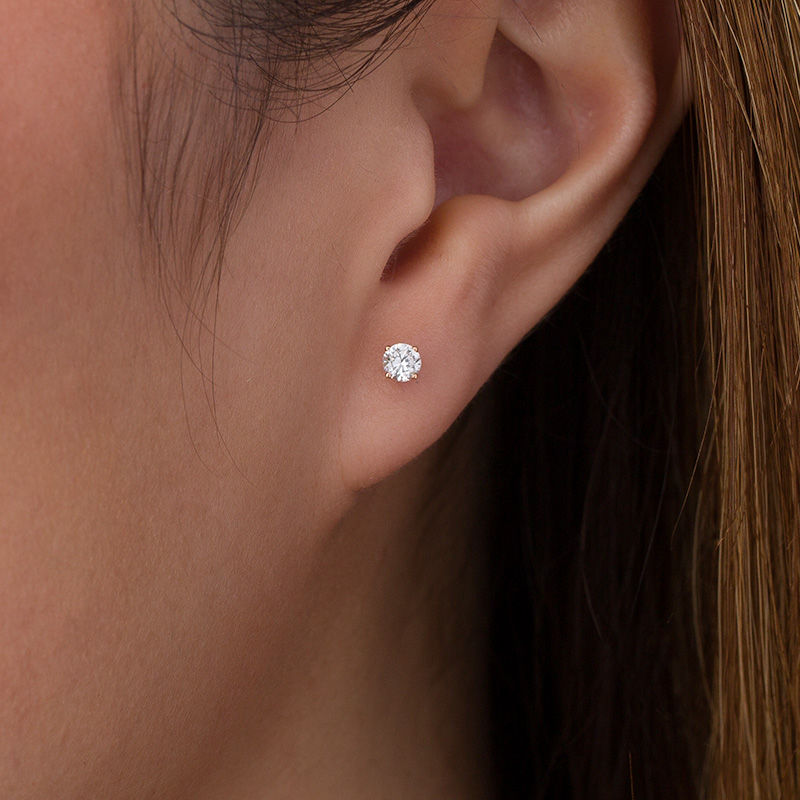 0.20 CT. T.W. Diamond Solitaire Stud Earrings in 10K Rose Gold