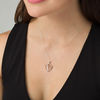 0.10 CT. T.W. Diamond Double Heart Pendant in 10K Two-Tone Gold