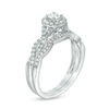 0.45 CT. T.W. Diamond Frame Twist Bridal Set in 10K White Gold