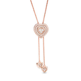 0.23 CT. T.W. Diamond Double Heart Frame Lariat Necklace in Sterling Silver with 14K Rose Gold Plate - 26&quot;