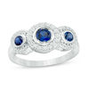 Thumbnail Image 0 of Bezel-Set Lab-Created Blue and White Sapphire Frame Three Stone Ring in Sterling Silver