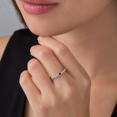 Bezel-Set Lab-Created Blue and White Sapphire Three Stone Station Ring in Sterling Silver