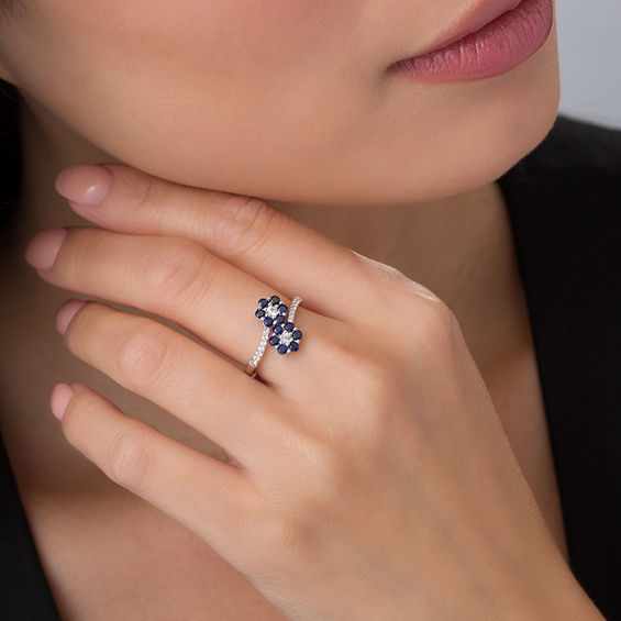 Lab-Created Blue and White Sapphire Double Flower Bypass Ring in Sterling Silver